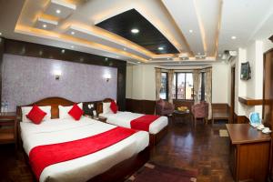 Ένα ή περισσότερα κρεβάτια σε δωμάτιο στο Samsara Boutique Hotel
