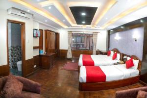 Ένα ή περισσότερα κρεβάτια σε δωμάτιο στο Samsara Boutique Hotel