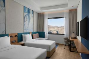 Courtyard by Marriott Makkah客房内的一张或多张床位 更多80张照片
