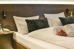 Postel nebo postele na pokoji v ubytování BergAlpine