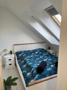 Posteľ alebo postele v izbe v ubytovaní Picúr és Manó Apartmanja