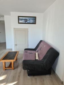 Posezení v ubytování Appartement T2 spacieux à FREHEL