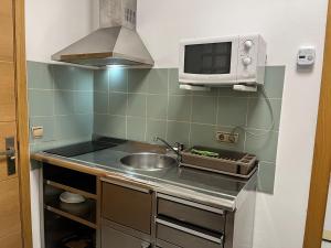 Kuchyňa alebo kuchynka v ubytovaní Habitaciones La MAR