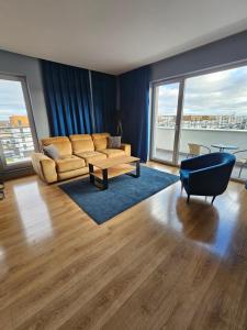 Posezení v ubytování VIP Apartament-Marine