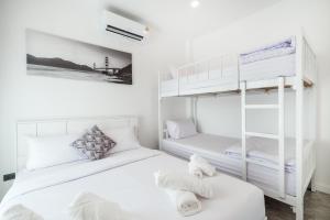 Postel nebo postele na pokoji v ubytování Happy Time Pool Villa HuaHin + 31 fotografií