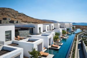 an image of a hotel with a swimming pool at Odera, Tinos, Autograph Collection in Kionia