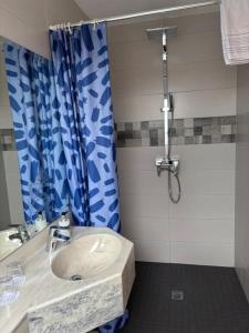 Kopalnica v nastanitvi Ambiente Hotel Strehla