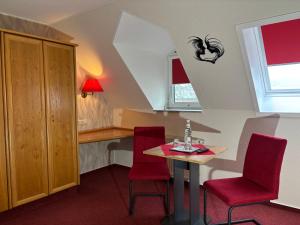 Predel za sedenje v nastanitvi Ambiente Hotel Strehla