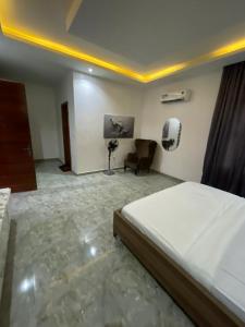 Postel nebo postele na pokoji v ubytování Lama Apartment & Suites