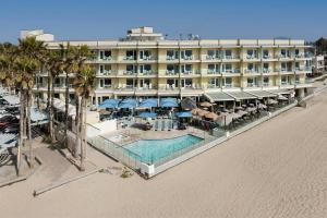 an aerial view of a hotel on the beach at Pier South Resort, Autograph Collection in Imperial Beach