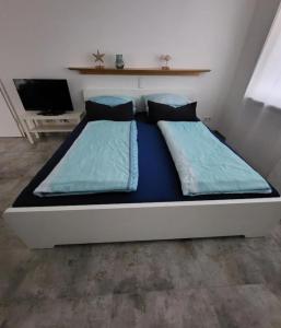 Postel nebo postele na pokoji v ubytování Appartement Claudia