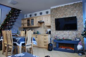 Kuchyňa alebo kuchynka v ubytovaní Apartament Butorowy Kościelisko