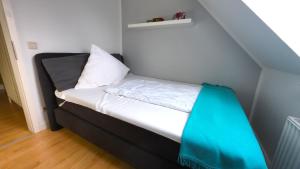 Postel nebo postele na pokoji v ubytování Sea Lounge