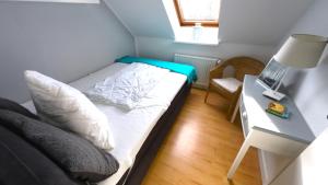 Postel nebo postele na pokoji v ubytování Sea Lounge
