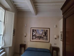 Posteľ alebo postele v izbe v ubytovaní Relais Dei Mercanti B&B And Suites
