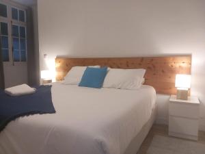 Postel nebo postele na pokoji v ubytování Lagoa Hostel & Suites