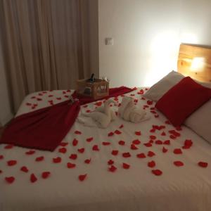 Postel nebo postele na pokoji v ubytování Lagoa Hostel & Suites