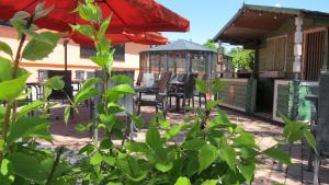 Vrt pred nastanitvijo Ambiente Hotel Strehla