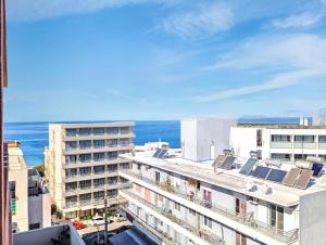 a view of the ocean from a building at 7-Modern city center studio with sea view! in Rhodes Town