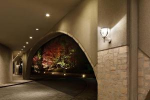 a painting on the wall of a hallway at The Prince Kyoto Takaragaike, Autograph Collection in Kyoto