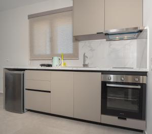 Afbeelding uit fotogalerij van Fasma suites in Perdhika