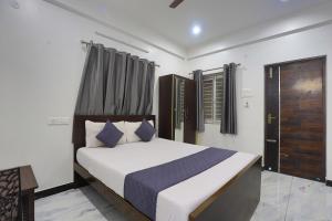 Katil atau katil-katil dalam bilik di Hotel AR Residency