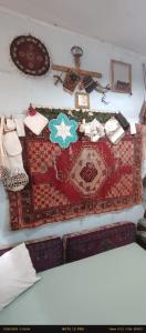 A bed or beds in a room at Nur home1
