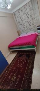 A bed or beds in a room at Nur home1