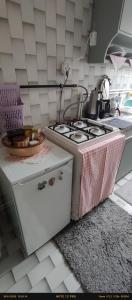 A kitchen or kitchenette at Nur home1