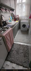 A kitchen or kitchenette at Nur home1