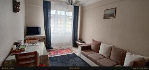 A television and/or entertainment centre at Nur home1