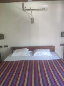 Postel nebo postele na pokoji v ubytování Menik's place