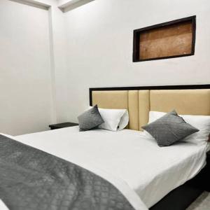 Katil atau katil-katil dalam bilik di Aashiyana residencies