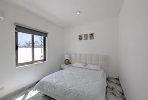 Postel nebo postele na pokoji v ubytování Ruby 111