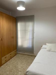 Posteľ alebo postele v izbe v ubytovaní Apartamento Camberos Antequera