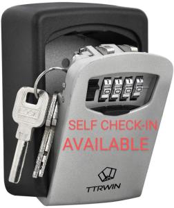 a self check in available machine with a key at The Smart Choice Apartments in Florence