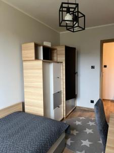 Ένα ή περισσότερα κρεβάτια σε δωμάτιο στο Apartament Francuska +9 φωτογραφίες