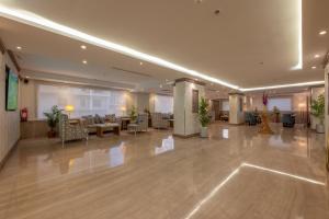 a lobby with couches and chairs in a building at Le Beaurivage Hotel in Jeddah