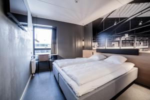 Giường trong phòng chung tại Four Points Flex by Sheraton Aalborg