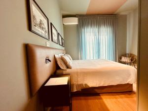 Llit o llits en una habitació de B&B Donna Ca'