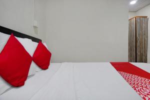 Postel nebo postele na pokoji v ubytování Hotel O Metro View