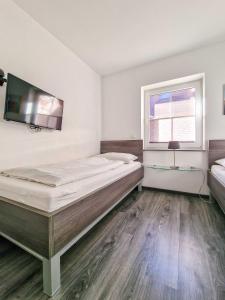 Ένα ή περισσότερα κρεβάτια σε δωμάτιο στο Kati +14 φωτογραφίες