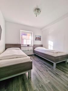 Ένα ή περισσότερα κρεβάτια σε δωμάτιο στο Kati