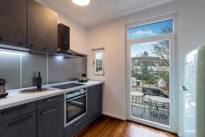 Nhà bếp/bếp nhỏ tại Mokka Suite Design in Neumünster