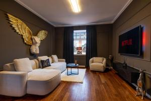 TV/trung tâm giải trí tại Mokka Suite Design in Neumünster