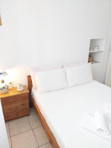 A bed or beds in a room at Kasi's nature home