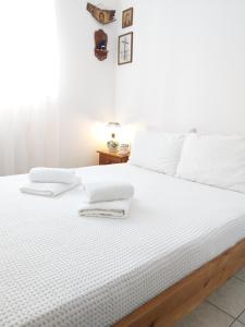 A bed or beds in a room at Kasi's nature home