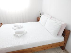 A bed or beds in a room at Kasi's nature home