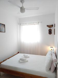 A bed or beds in a room at Kasi's nature home