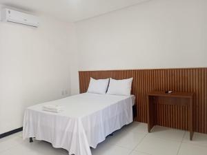 Postel nebo postele na pokoji v ubytování Hotel Itaberaba + 36 fotografií